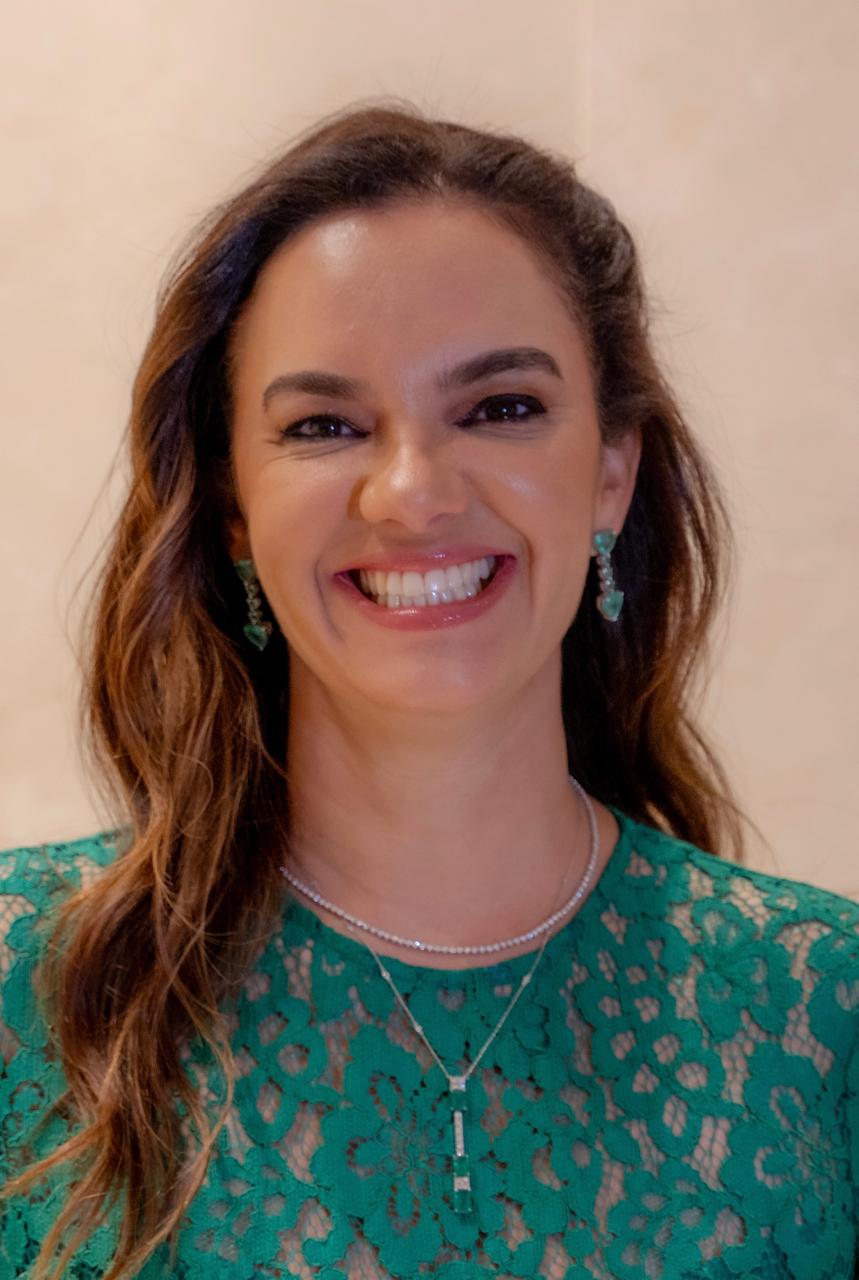 Dra. Flávia Magella